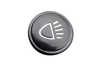 Centre cap for headlamp switch knob